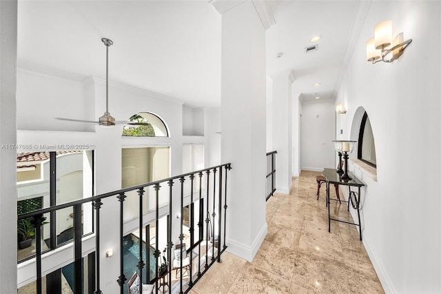 hall featuring ornamental molding
