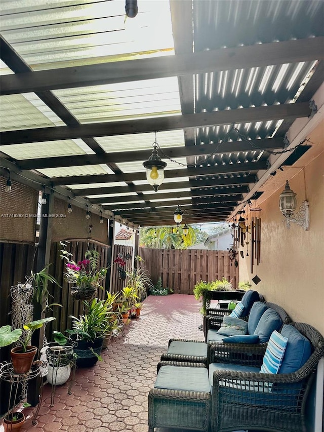 view of patio / terrace with fence and a pergola