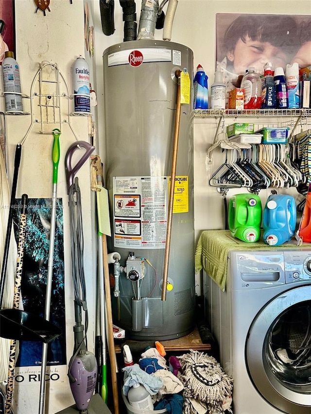 interior space with washer / clothes dryer and gas water heater