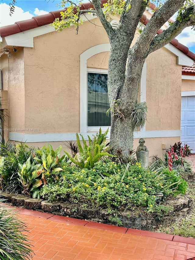 exterior space featuring stucco siding