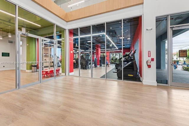 exercise room featuring hardwood / wood-style flooring