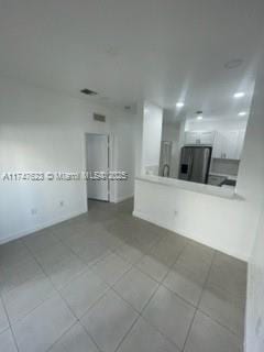 view of tiled empty room