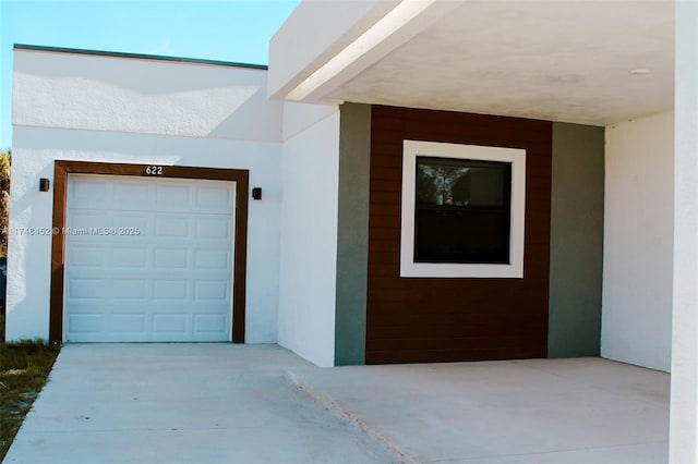 entrance to property featuring a garage