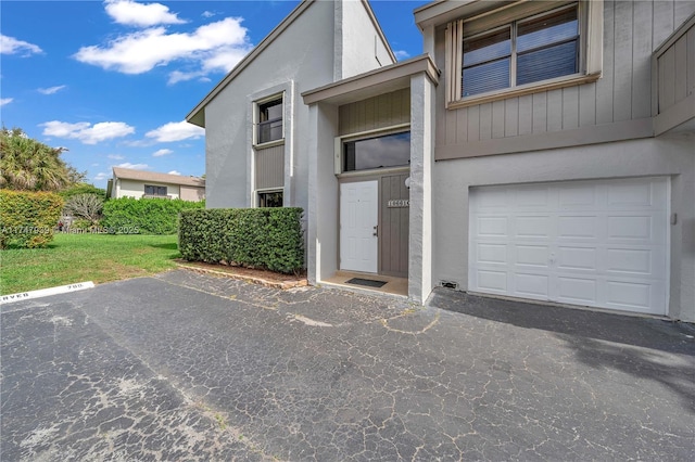 property entrance with a garage