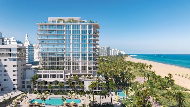 property view of water featuring a beach view