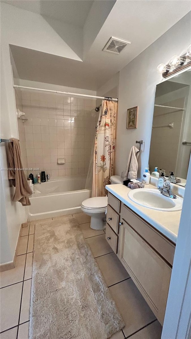 full bathroom featuring tile patterned floors, shower / bathtub combination with curtain, toilet, and vanity