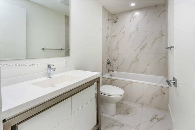 full bathroom with toilet, vanity, and tiled shower / bath combo