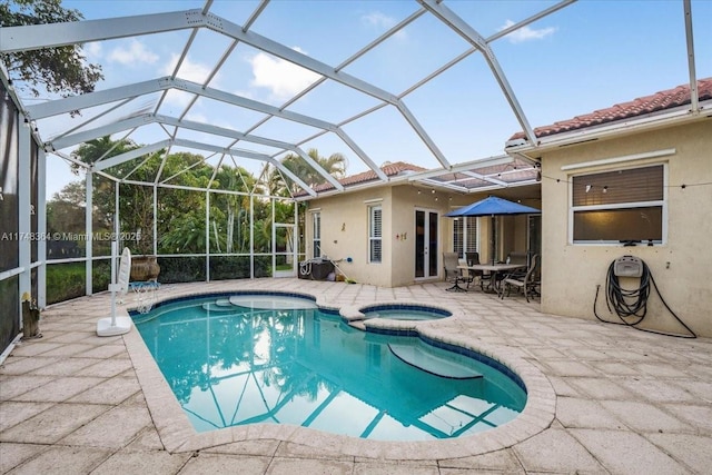 2813 Augusta Ln, Homestead, FL 33035 - view of pool with a patio area, a pool with connected hot tub, and glass enclosure