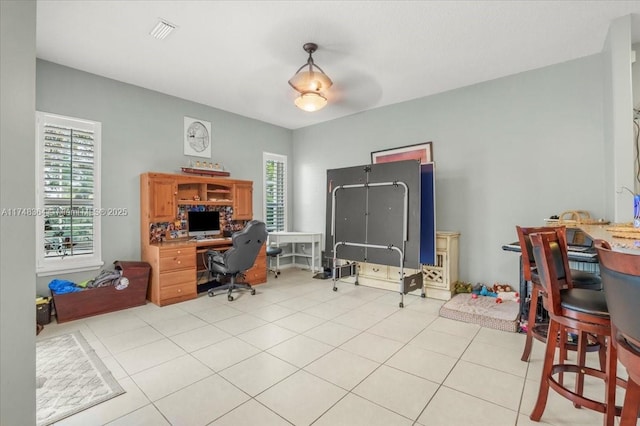2813 Augusta Ln, Homestead, FL 33035 - home office with plenty of natural light and light tile patterned floors