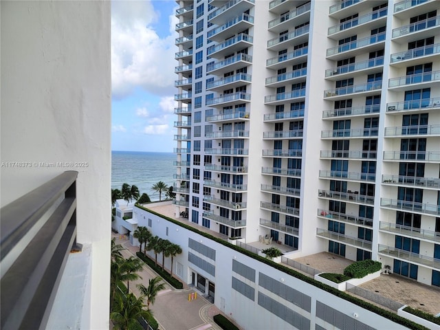 balcony featuring a water view