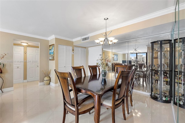 dining space featuring a chandelier and crown molding