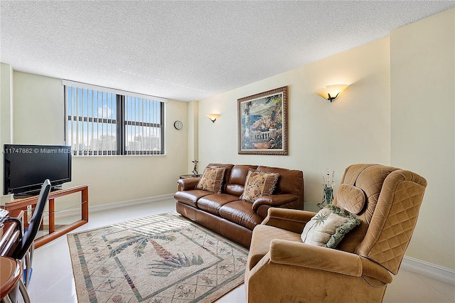 living room featuring a textured ceiling