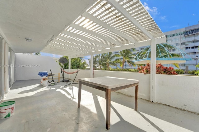 view of patio featuring a pergola