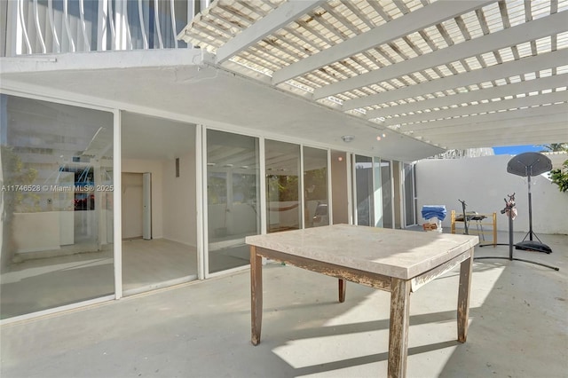 view of patio featuring a pergola