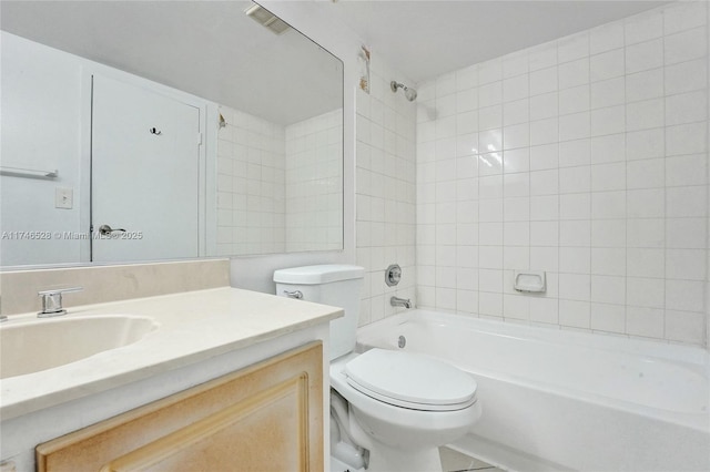bathroom with toilet, washtub / shower combination, visible vents, and vanity