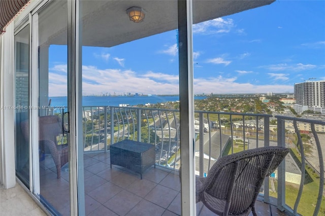 balcony featuring a water view