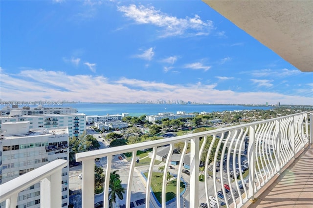 balcony featuring a water view