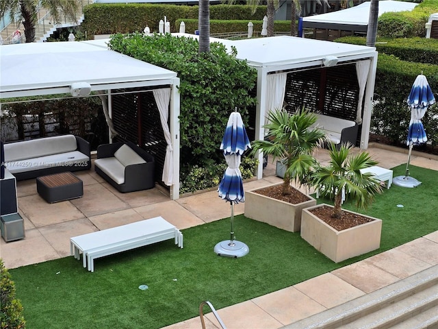 view of patio with a gazebo and an outdoor hangout area