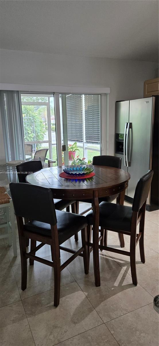 view of tiled dining space