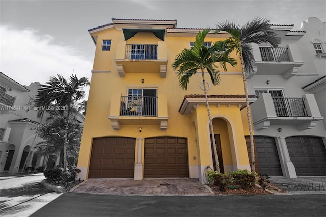 mediterranean / spanish house with a balcony