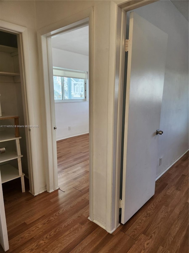 455 Golden Isles Dr Unit 309, Hallandale Beach, FL 33009 - hallway featuring dark wood-type flooring