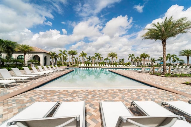 community pool with a patio