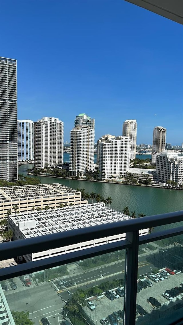 property's view of city with a water view