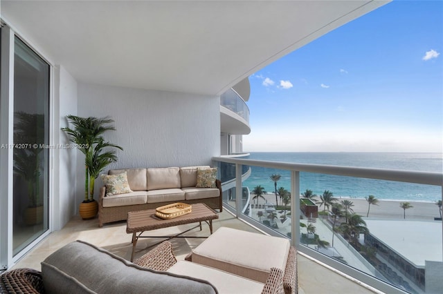 balcony with a beach view, outdoor lounge area, and a water view