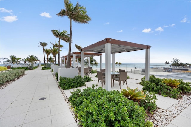 view of community featuring a water view and a gazebo