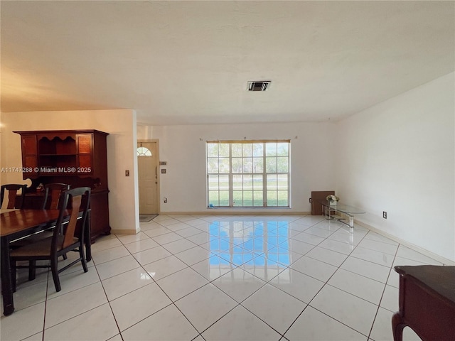 living room with light tile patterned floors