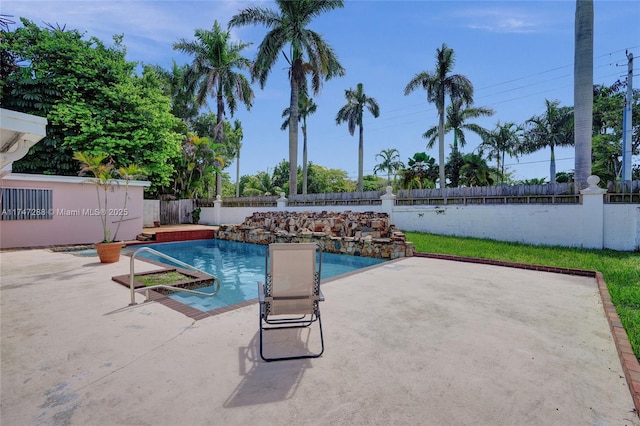 view of swimming pool featuring a patio