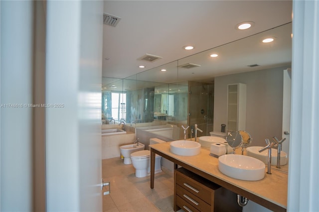 full bath with visible vents, recessed lighting, a garden tub, and a shower stall