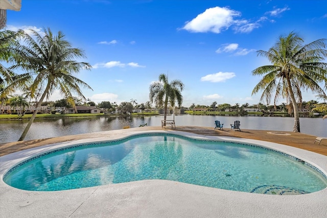 view of pool featuring a water view