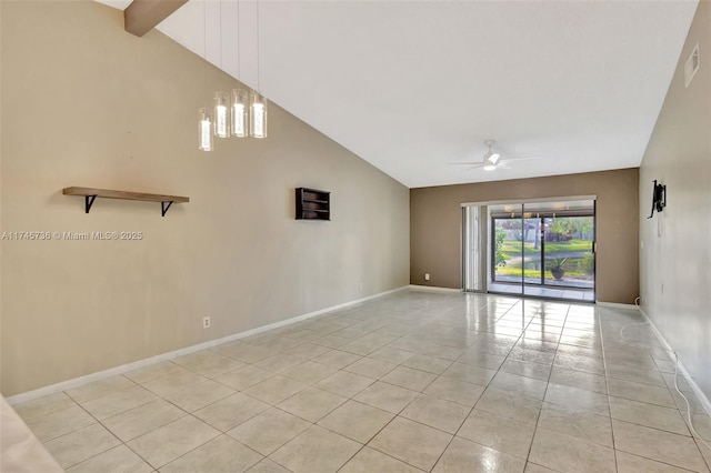 tiled empty room featuring vaulted ceiling with beams and ceiling fan with notable chandelier