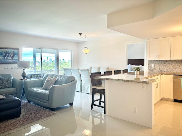 living room with light tile patterned floors