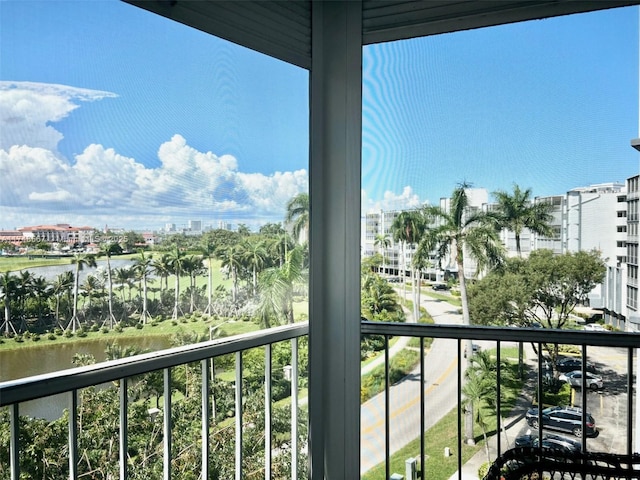 balcony featuring a water view