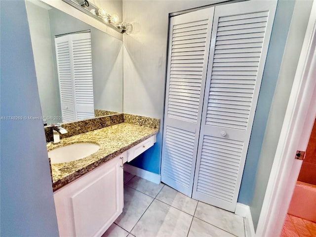 bathroom featuring tile patterned floors and vanity