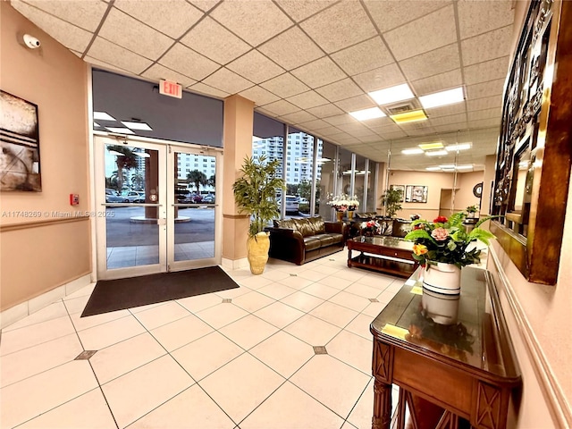 building lobby featuring visible vents and a city view