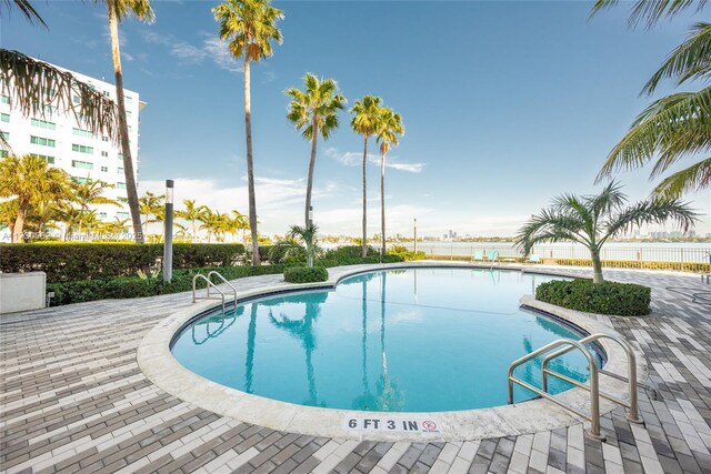 7501 E Treasure Dr Unit 4H, North Bay Village, FL 33141 - pool with fence