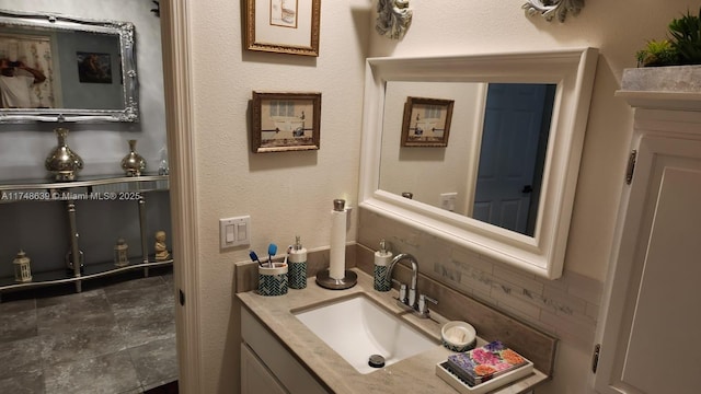 bathroom with backsplash and vanity