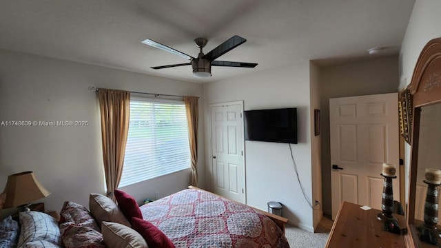 carpeted bedroom featuring ceiling fan