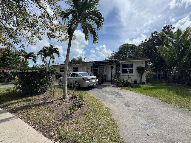 view of front of home with a front lawn