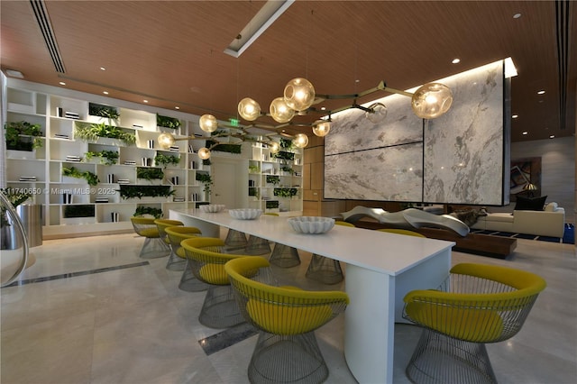 kitchen with a kitchen island, recessed lighting, wooden ceiling, and built in shelves