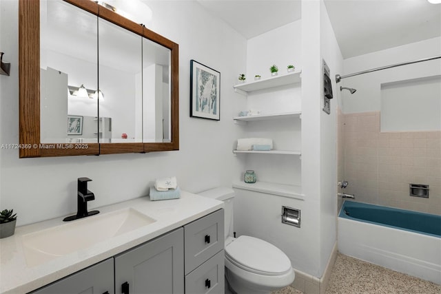 bathroom with toilet, vanity, and shower / tub combination