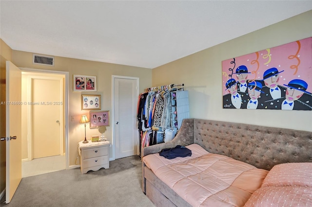 235 Kent N Unit 235, West Palm Beach, FL 33417 - bedroom featuring visible vents, carpet, and a closet