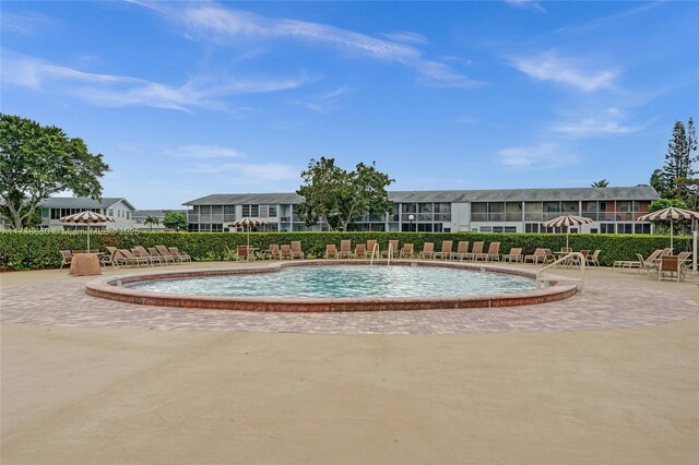 235 Kent N Unit 235, West Palm Beach, FL 33417 - pool with a patio and a residential view