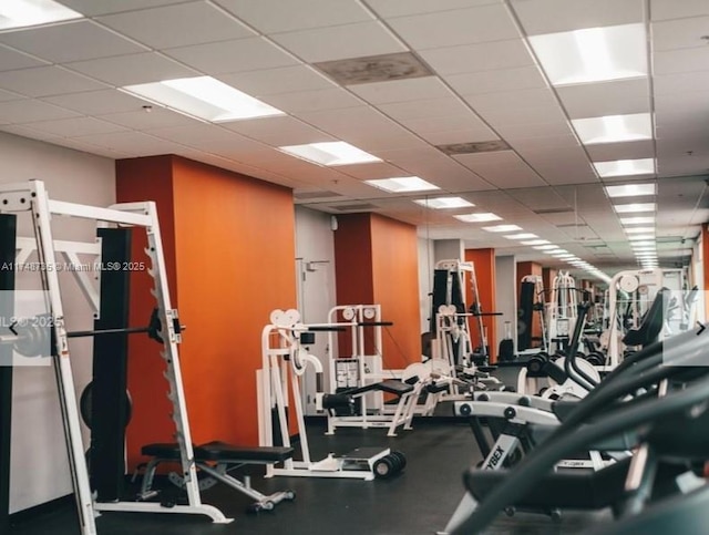 gym featuring a paneled ceiling