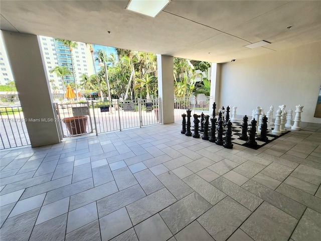 view of patio / terrace featuring fence