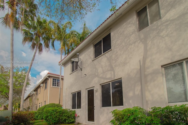 view of property exterior with stucco siding