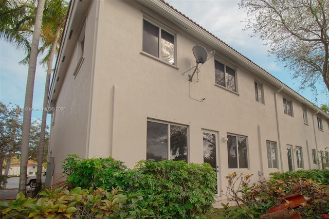 exterior space featuring stucco siding